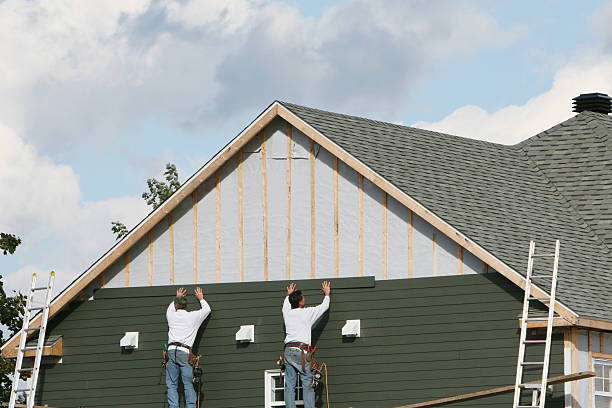 Professional Siding technician working in Weston, WV